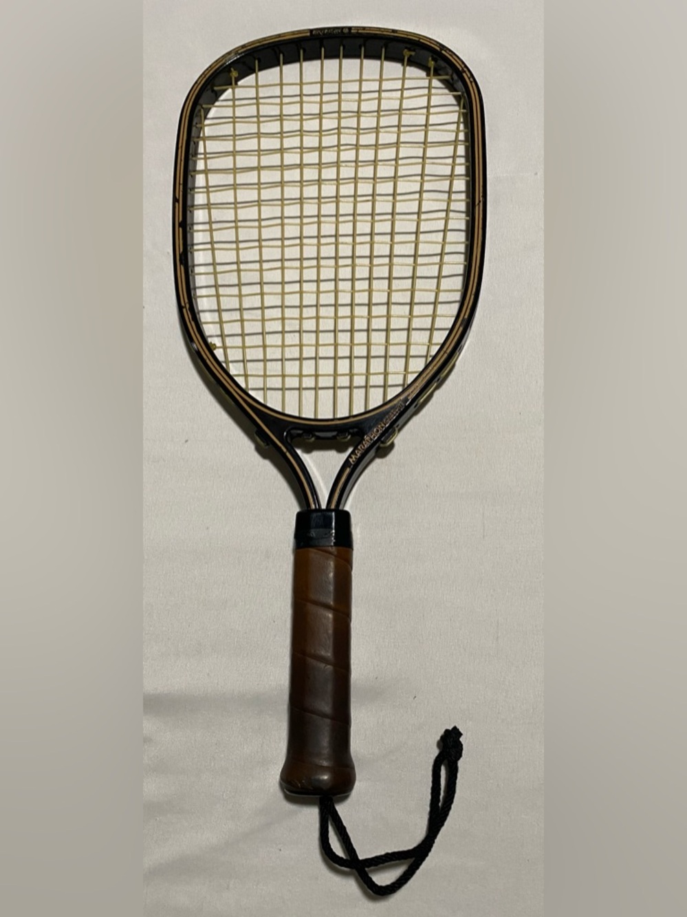 Vintage Brown Tennis Racket with Leather Grip